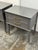 Design Plus Gallery presents a Pair of Nightstands from Ameriwood Home. This matching set has a streamlined gray case with...
