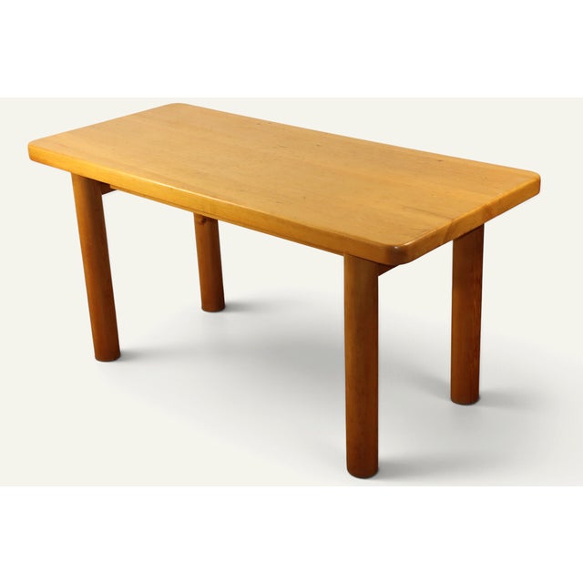 Solid pine table designed by René Martin in the 1960s, a leading figure in French modernist furniture. Its clean lines,...