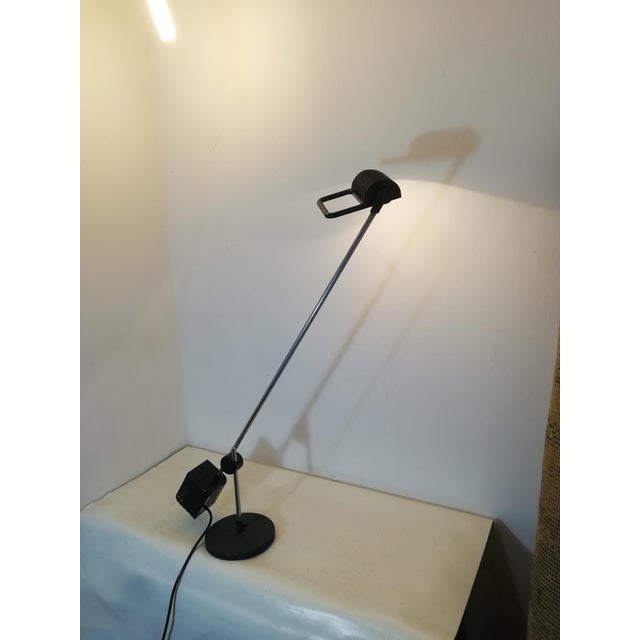 Handle-style table lamp designed by D'Urbino, Lomazzi, and De Pas for Stilnovo Italia. Excellent functionality. Good...