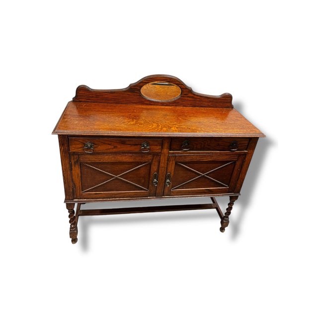 Bring timeless character and practical storage to your home with this beautiful antique oak sideboard buffet. Crafted from...