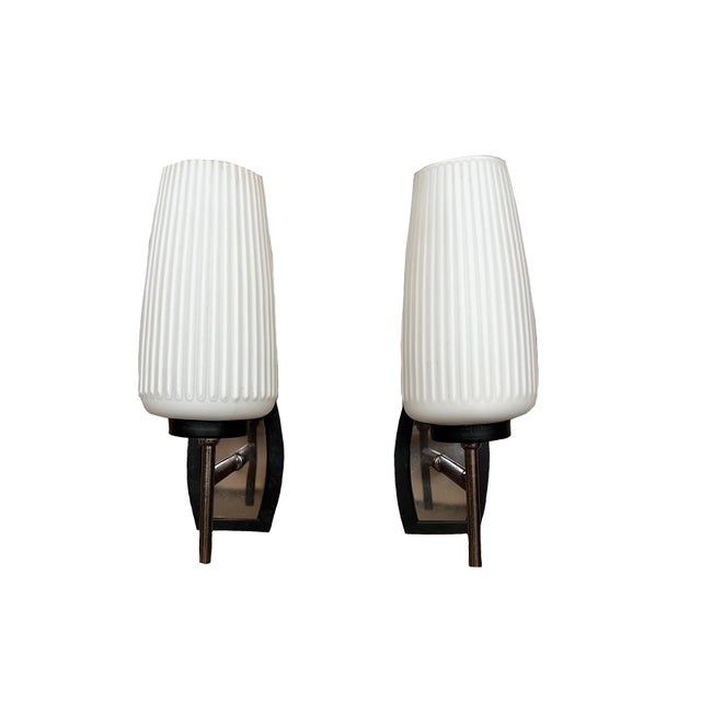 Pair of Italian mid-century wall lights, 1960-70s Pair of Italian mid-century wall lights from the 1960-70s, featuring...