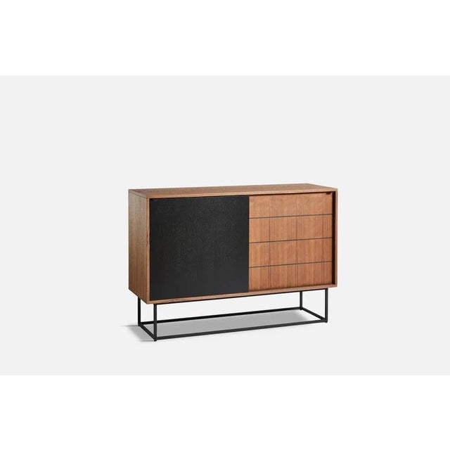 Virka high sideboard by ropke design and moaak materials: walnut, metal. Dimensions: d 40 x w 120 x h 82 cm also available...