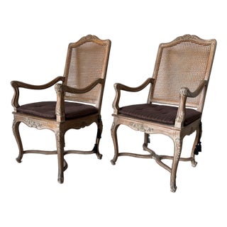 Vintage Hollywood Regency Louis XV-Style Carved Wood & Cane Armchairs – A Pair For Sale