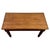 A handsome early 20th-century English side table, finely crafted from oak and distinguished by its substantial...