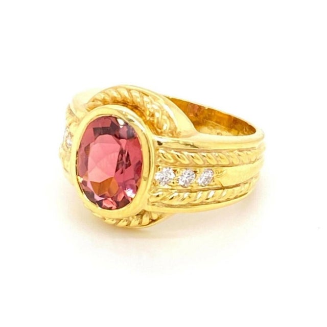 The Judith Ripka Diamond Pink Tourmaline 18k Yellow Gold Ring in size 6 is a stunning piece of vintage and antique...