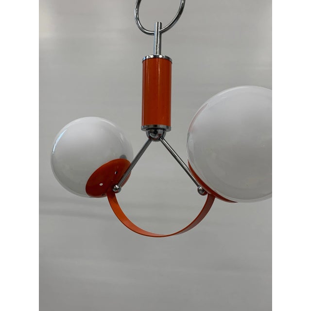 Chandelier with 2 lights attributed to stilnovo. approximately 1970s. it is a warehouse find and does not have many signs...