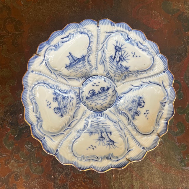 Vintage German Blue and White Porcelain Oyster Plate This antique oyster plate is crafted from porcelain by Weimar in...