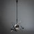 Futuristic five-arm Space-Age chandelier featuring a central aluminum sphere and elegantly curved arms with black sockets....