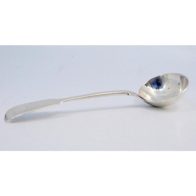 Plain Silver Sauce Spoon with Flared Handle, in Very Good conditions. Designed 1890 to 1919 This piece has an attribution...