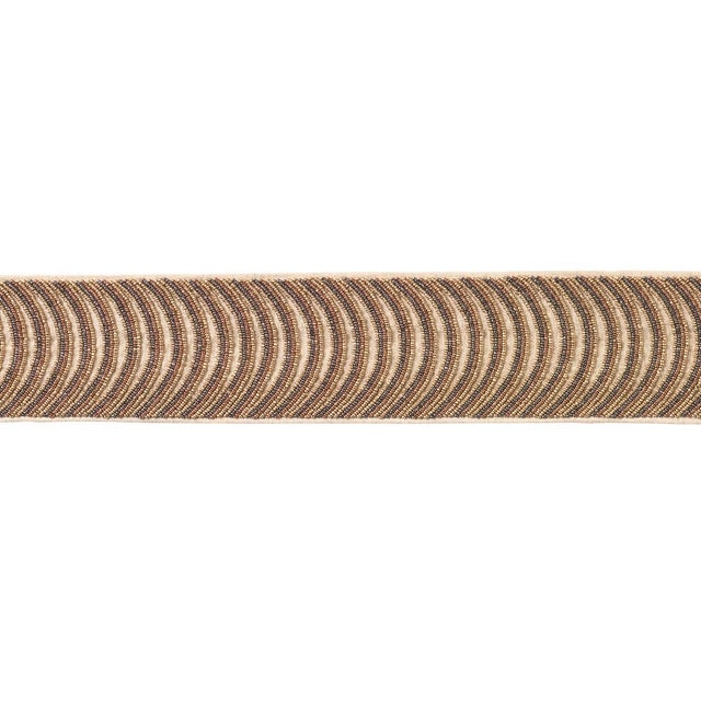 The epitome of flapper-era glamour, Ziegfeld Hand Beaded Tape features a hand-beaded scallop motif on a linen ground. At...