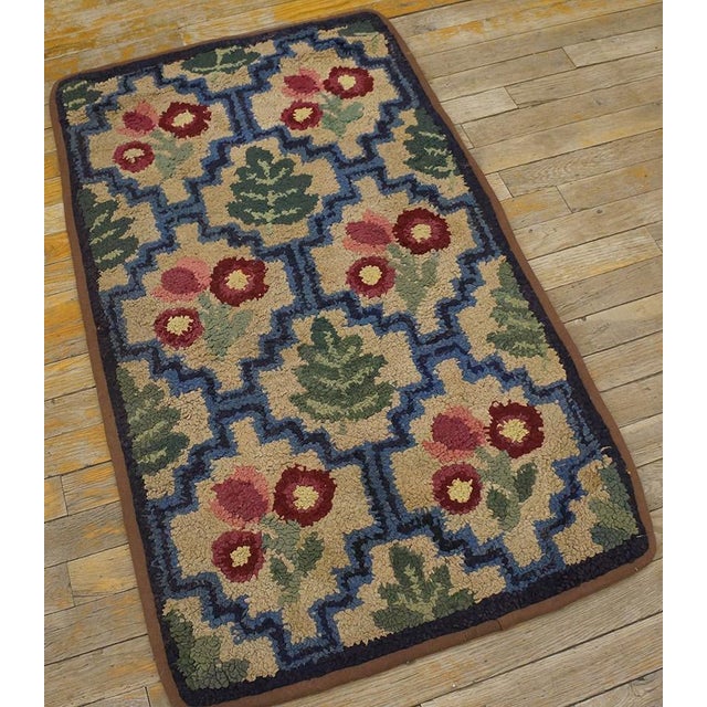 Antique American hooked rug. Measures: 2'0" x 3'0".