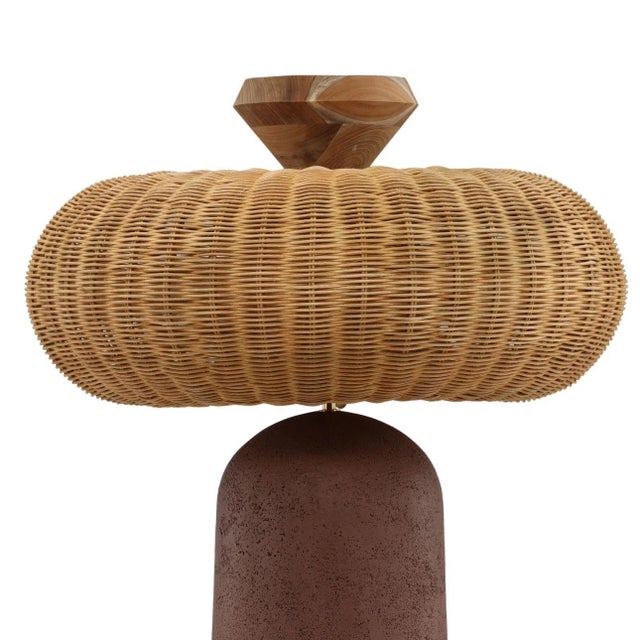 A striking blend of natural texture and sculptural form, this floor lamp brings artisan-inspired warmth to any space....