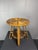 Occasional table in rattan and pencil reed, Italian manufacture, approximately 1950s. Constructed with bundled rattan pole...