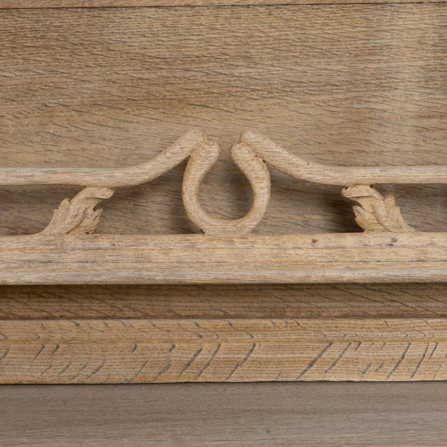 1910s French Art Nouveau Oak Vitrine With Floral Details. This exceptional vitrine embodies the flowing organic beauty of...