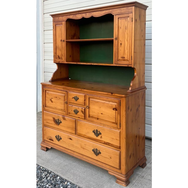 Nice size pine farmhouse cupboard. Two piece Stepback design. Open top features a single fixed shelf with raised paneled...