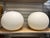 From the Nelson Bubble Pendant Lamp series, designed by George Nelson in the 1950s. These two globe pendants are crafted...