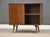 A mid century modern solid maple cabinet credenza designed by Paul McCobb for Winchendon’s Planner Group with two sliding...
