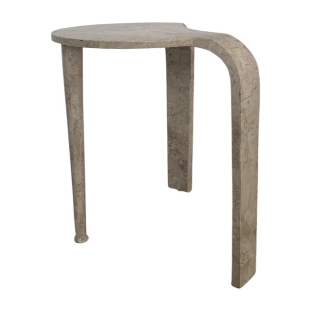 This is an exceptional tripod waterfall table inlaid with tessellated stone. Two legs are flat, one is shaped like a post...