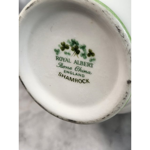 Single, beautiful vintage Royal Albert bone China tea cup with lovely clover/shamrock folliage. Perfect addition to any...