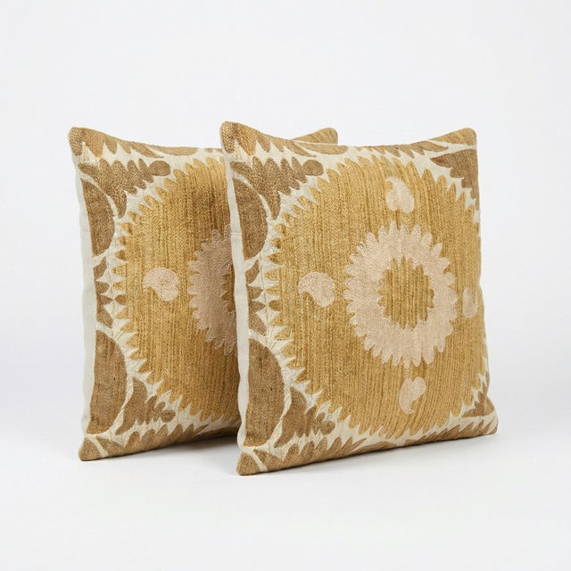 This beautiful 24'' x 25'' & 24'' x 24'' hand-embroidered Suzani pillow cover set was made from authentic Uzbek cotton...