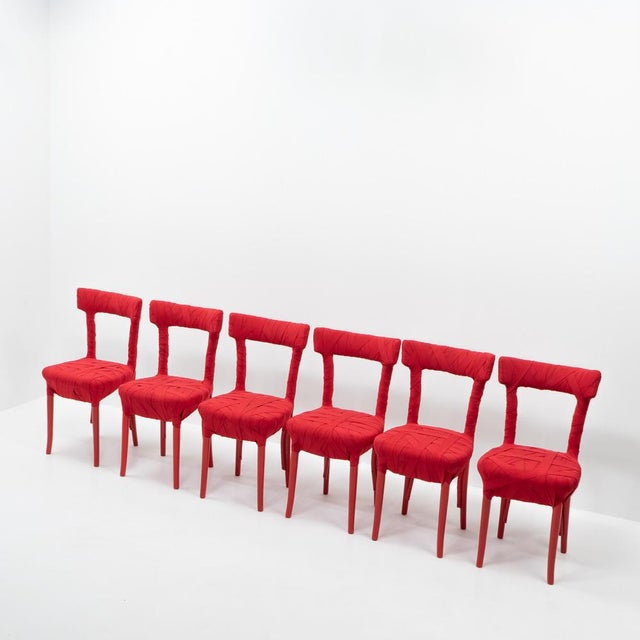 Mummy Chairs by Peter Traag. The chair's distinctive form is achieved by wrapping the beechwood and painted frame in...