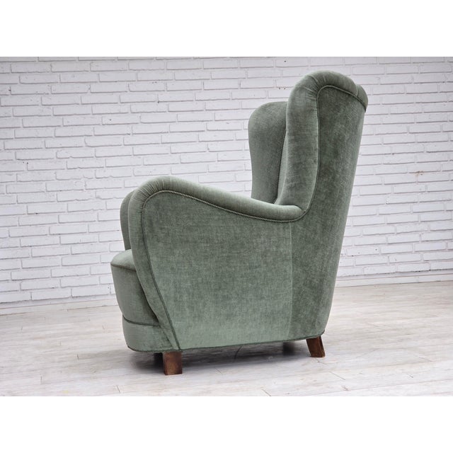 1960s, Danish highback relax chair. Green furniture velour, ash wood legs, brass springs in the seat. Original very good...