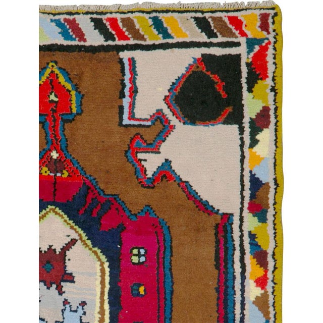 A vintage Persian hamadan rug from the mid-20th century. Hamadan town and the surrounding weaving area of about 120...