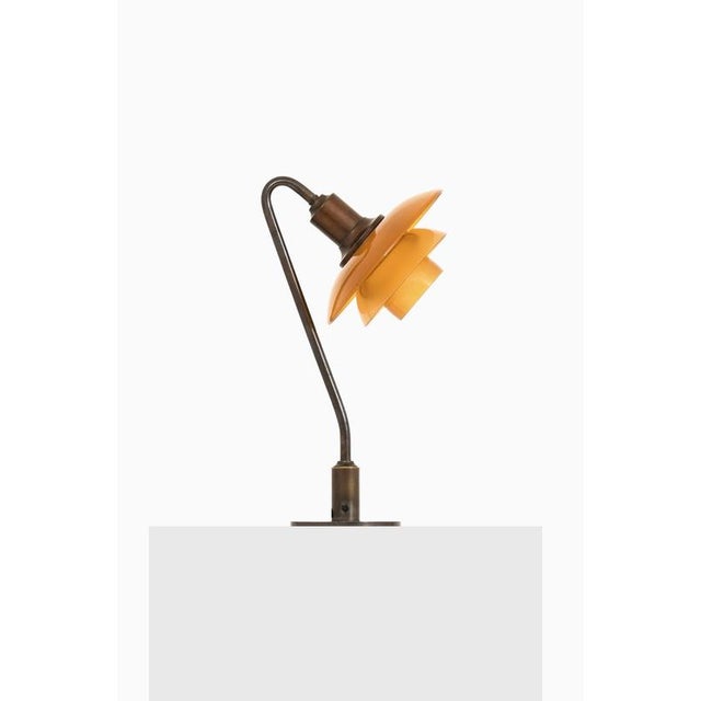 Table lamp in browned brass frame by poul henningsen, 1931-1933 additional information: material: browned brass frame....