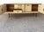 Stone Hill Furniture Asian Modern Hollywood Regency Credenza Offered for sale is an Asian-influenced mid-century modern...