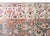 This antique Persian Mehraban rug, dating to circa 1920, features an elegant all-over floral design on a sophisticated...