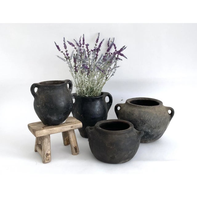 Over 100 years old and used for making and storing yoghurt, these handmade vessels are irregular in shape and made from a...