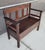 Scarce Mission Oak / Arts & Crafts hall bench made by Lifetime Furniture. Circa. 1910. Retains "Lifetime" paper label....