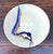 This handcrafted abstract glazed ceramic bowl is a striking example of contemporary studio pottery, blending expressive...