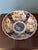Beautiful hand-painted Imari porcelain bowl with an elegant scalloped rim. The bowl is richly decorated in the...