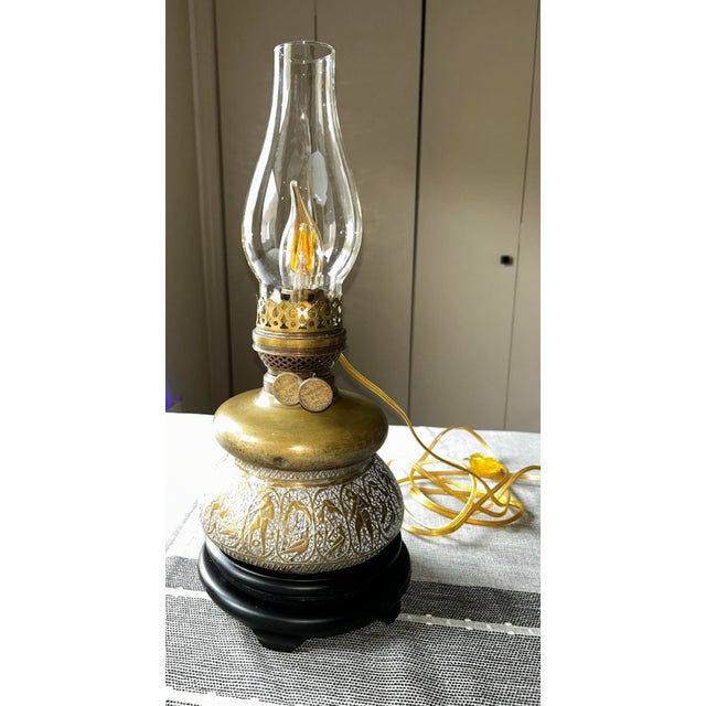 Originated in China or Japan. Imported and retailed by A.A. Vantine & Company of New York. Has been electrified. Glass...