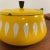 Vintage bright yellow Cathrineholm Enamelware Lotus Fondue Pot. Very little signs of use or wear. The rim is very good,...