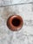 Beautiful signed miniature terracotta pot. It is handmade and carved geometric designs. Signed by Walter Lopez on the bottom