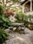 Vintage Cast Stone Garden Dining Set With Dolphin Pedestal Table & Three Matching Stools For Sale - Image 10 of 12