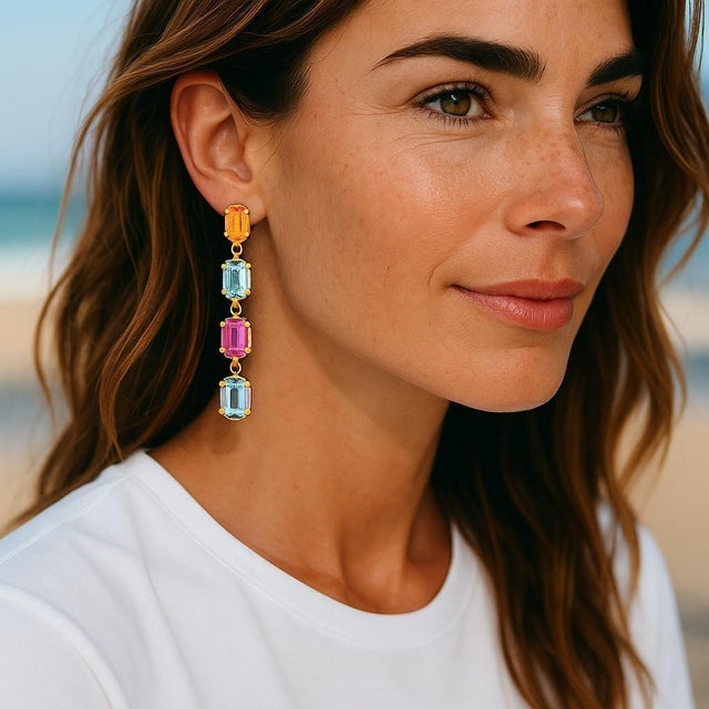 Add a touch of timeless elegance and vibrant color to your jewelry collection with these stunning 14K yellow gold drop...