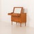 This charming Danish mid-century dresser features a hidden vanity and it was made some time in the 1960s. It seamlessly...