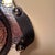 2010s Global Views Hammered Nickel Oval Tray With Black Leather Handles & Ball Feet For Sale - Image 5 of 5