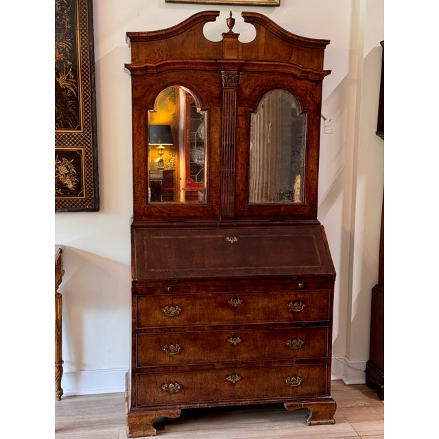 A substantial early 18th century Dutch two-part secretary in burl walnut with a beautifully mellowed patina. The upper...