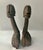 Spectacular mid-century African carved sculptures of man and woman. Circa 1950s. Solid wood. Bottoms are marked with a 1...