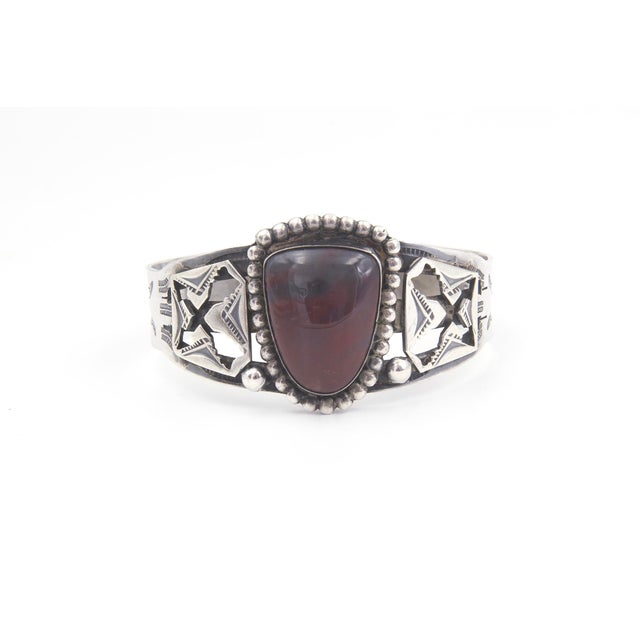 Fred Harvey Style Sterling Silver and Chalcedony Cuff Bracelet A sterling silver cuff bracelet featuring a central oval...
