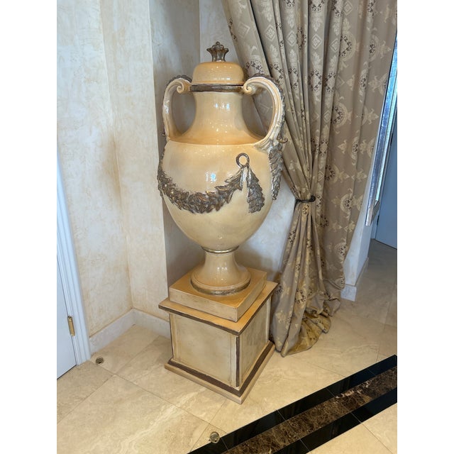 Signed Ezio Ceccarelli Terra Cotta Urn with Pedestal – 64” Statement Piece Make a bold, sophisticated statement with this...