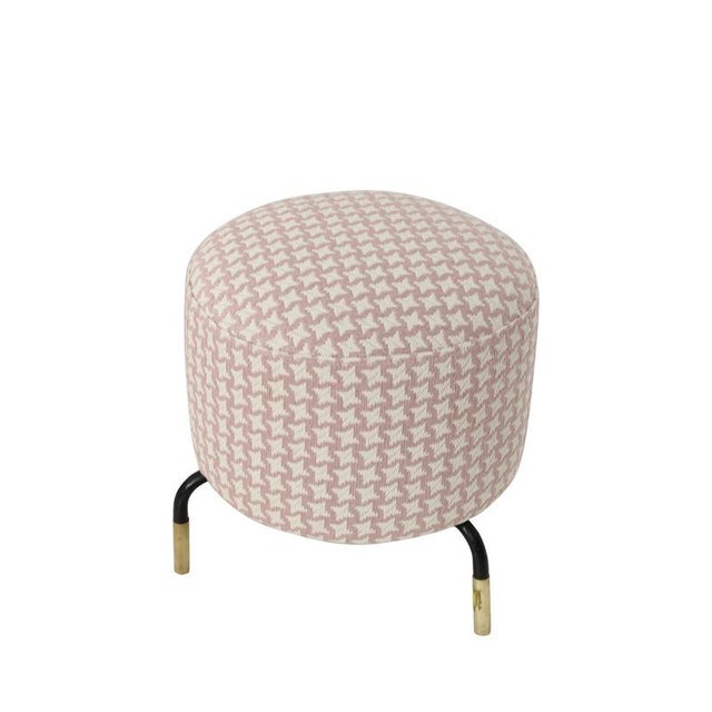 Elegant Italian footstool from the 1950s, featuring a round form upholstered in pink and white fabric with a geometric...