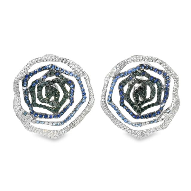 18K White Gold Diamond Sapphire Floral Designer Earrings. This striking oversized pair features numerous brilliant round...
