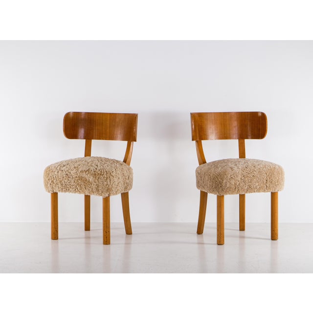 Model Birka. Produced by NK, 1930s. Newly upholstered in honey colored sheep skin. This piece is attributed to the...