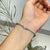 Transparent Handmade Round 9.1 Ct Rainbow Moonstone Bezel Set Infinity Line Tennis Bracelet in 925 Silver For Sale - Image 8 of 14