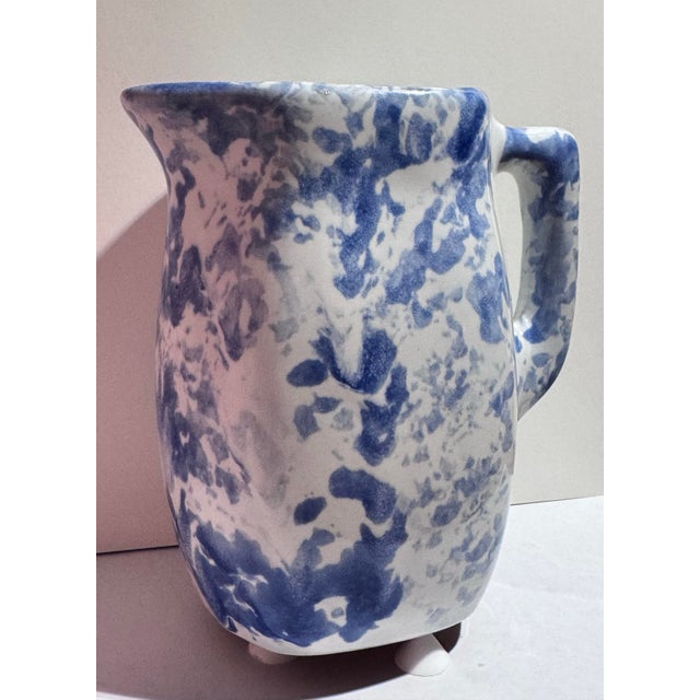 Bring historic Southern charm to your decor with this lovely vintage spongeware ceramic pitcher from the legendary Bybee...